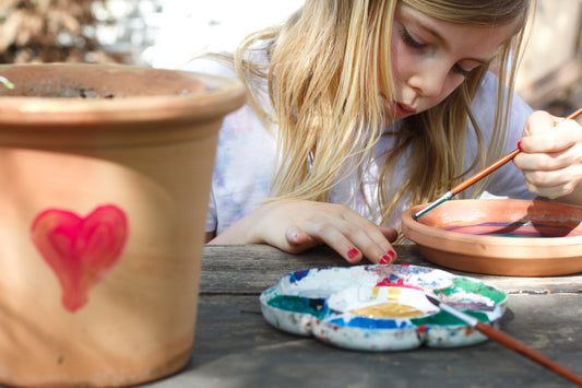 Simple & Affordable DIY Hand-Painted Terracotta Plant Pots